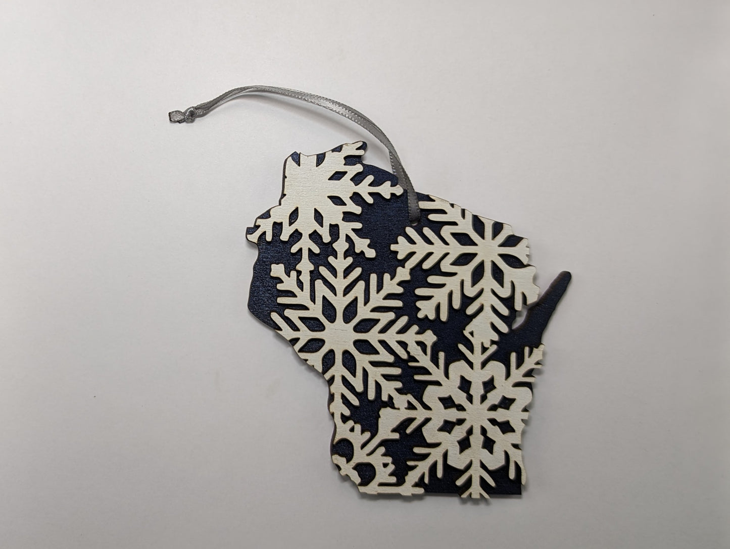 Snowflakes on 5" Wisconsin Wood Ornament or Magnet