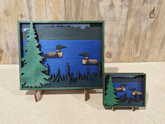 Two Loons swimming in a lake. Layered Wood Sign. Magnet option.